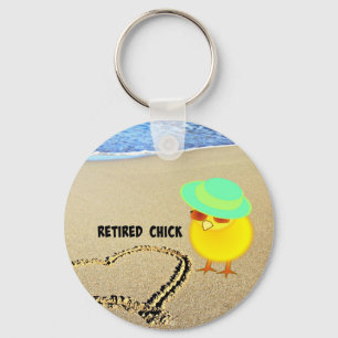 Pensionerad Chick vid stranden Nyckelring