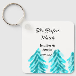 Perfekten matchar vinterblått gräs träd bröllop nyckelring
