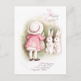 Perky vitpåskhare och flicka i rosaklänning helg vykort