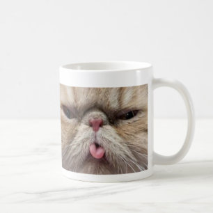 Perserkatt som ut klibbar tungan kaffemugg