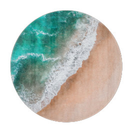 Persikohavet vatten på sommaren med kustsand