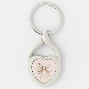 Persikokrembåge Twisted Heart Silverfärgad Nyckelring