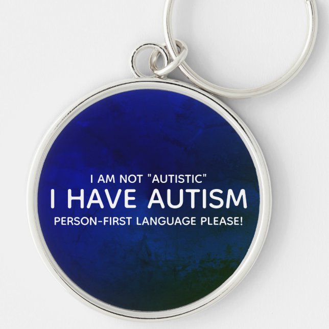 Person först autism rund silverfärgad nyckelring (Framsidan)