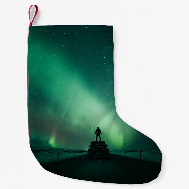PERSON FRAMFÖR AURORA LJUS LITEN JULSTRUMPA (Framsidan)