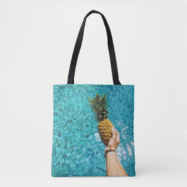 Person holding yellow pineapple tygkasse (Framsida)