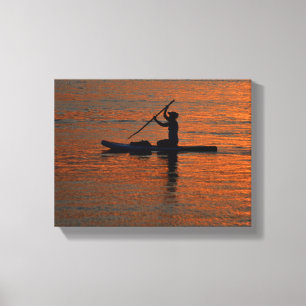 Person silhoutte kayaking vid flod canvastryck