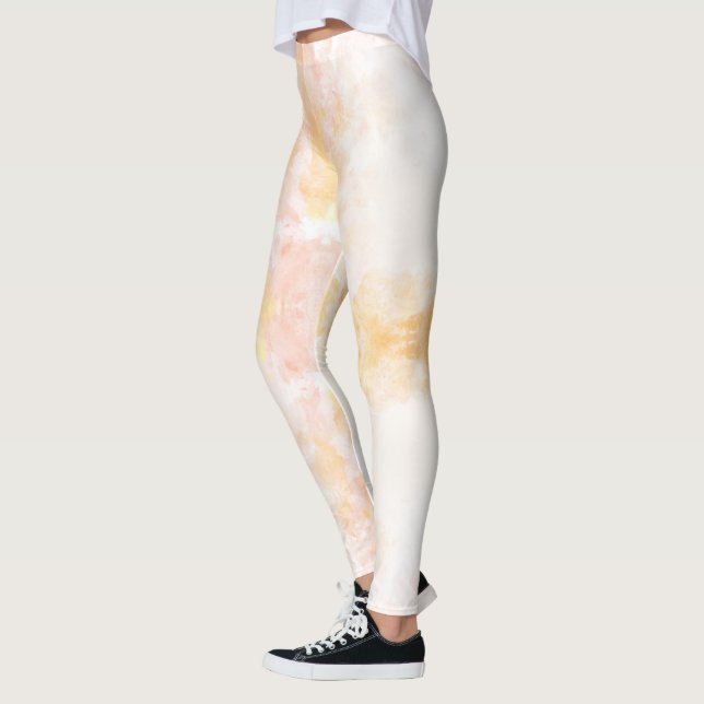 Person som bär leggings med en mjuk, pastell (Vänster)