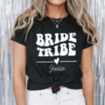 Personalized Bachelorette Party Bride Tribe T Shirt<br><div class="desc">Celebrate the bride-to-be in style with this chic and custom Bride Tribe t-shirt, featuring a playful heart and the name of your choice! Perfect for bachelorette parties, bridal showers, or a girls’ weekend getaway. Personalize each shirt for your tribe and create unforgettable memories in coordinated fashion. Stylish, comfy, and made...</div>