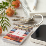 Personalized Book Lover Monogram<br><div class="desc">A charming book‑lover keychain featuring a colourful stack of illustrated book spines and a personalized monogram framed in a classic, literary style. Perfect for readers who want to carry a little piece of their bookish world wherever they go, this custom keychain adds warmth and personality to bags, keys, backpacks, and...</div>