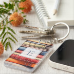 Personalized Book Lover Monogram<br><div class="desc">A charming book‑lover keychain featuring a colourful stack of illustrated book spines and a personalized monogram framed in a classic, literary style. Perfect for readers who want to carry a little piece of their bookish world wherever they go, this custom keychain adds warmth and personality to bags, keys, backpacks, and...</div>