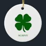 Personalized Green Clover Julgransprydnad Keramik<br><div class="desc">Simple Irish Four Leaf Clover Emerald Green Shamrock Design - Customize it with your own personalized names, words, colors! Celebrate good luck in style with this personalized Four Leaf Clover Design! Featuring a minimalist design with a simple yet modern touch, this mug can be customized with or without your name...</div>