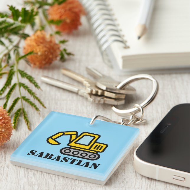 Personalized kid's keychain with toy excavator  (Högra Framsidan)