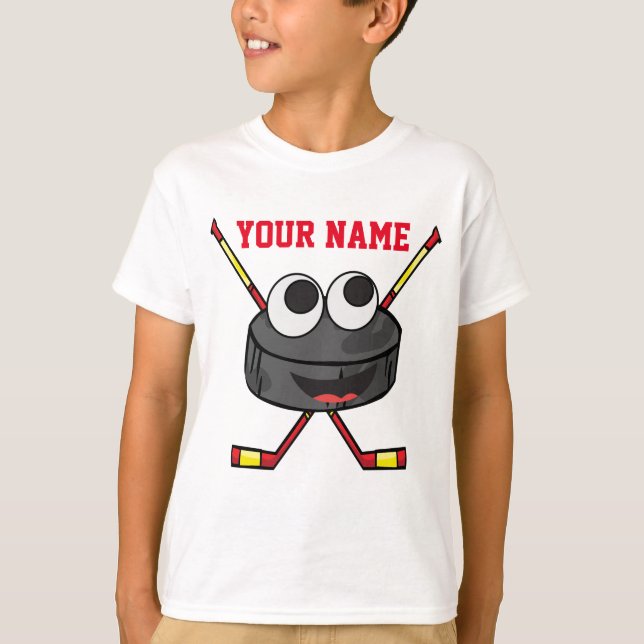 Personifierade gulliga ishockeypuck och pinnar tröja (Framsida)