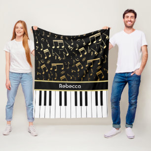 Personifierat guld- noterar, och pianot stämm fleecefilt