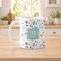 Personlig färgrik blomsterinitial kaffemugg