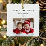 "Personlig God jul Ornament med Photo<br><div class="desc">"Fira julhelgen med den här Personligen God jul Ornament, med plats för ett anpassningsbar foto och namn. Perfekt som en hjärtlig hjärtefråga, denna prydnad tillför en personlig beröring till juldekorationen. Med en festlig "God jul hälsning" är det en idealisk gåva till familj, vänner eller någon speciell. Håll ut träd för...</div>