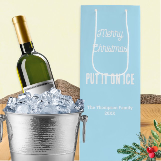Personlig God Jul Vit (An attractive wine bottle bag in light blue, with Merry Christmas words and 'Put It On Ice' caption)