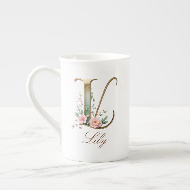 Personlig Initial L i Guld med Blommönster Benporslin Mugg (Vänster)