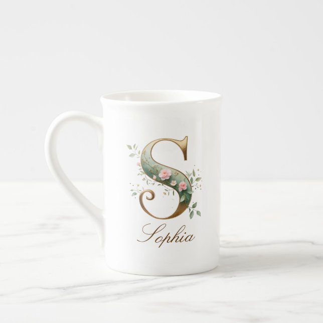 Personlig Initial S i Guld med Blommönster Benporslin Mugg (Vänster)