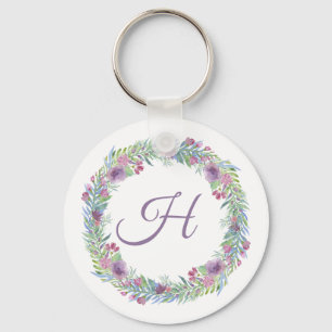 Personlig kransmonogram med blommor nyckelring