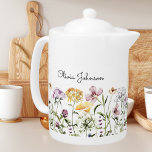 Personlig Namn WildblomGarden<br><div class="desc">Ta med en liten bit naturskönhet i ditt område med vår Personlig Namn Wildbloms Garden tekanna. Upptäck en härlig samling färgfulla blommor som kommer att ge naturens charm inomhus. Du kan lägga till ditt namn till det. Lämplig som gåva till natur och blomma älskare.</div>