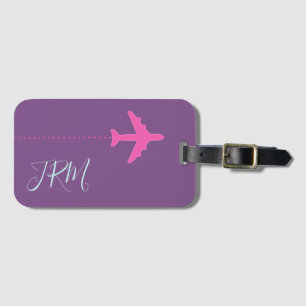 personlig rosa flygplan på lila monogrammet bagagebricka