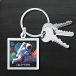 Personligen Namn i det moderna astronaut-området Fyrkantig Silverfärgad Nyckelring<br><div class="desc">Den färgstarka moderna astronaut Space-Personligen Namn Keychain har en astronaut som flyter genom rymden med färgstarka planeter och sväljer och personlig med ditt namn i modern manustypografi. Perfekt som en gåva till rymden älskare, familj och vänner för födelsedag, jul, helgdagar, Fars dag, bror, make, partner, bästa vänner, arbetskolleger och mycket...</div>