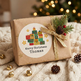 Personligt julklappspaket med namn runt klistermärke