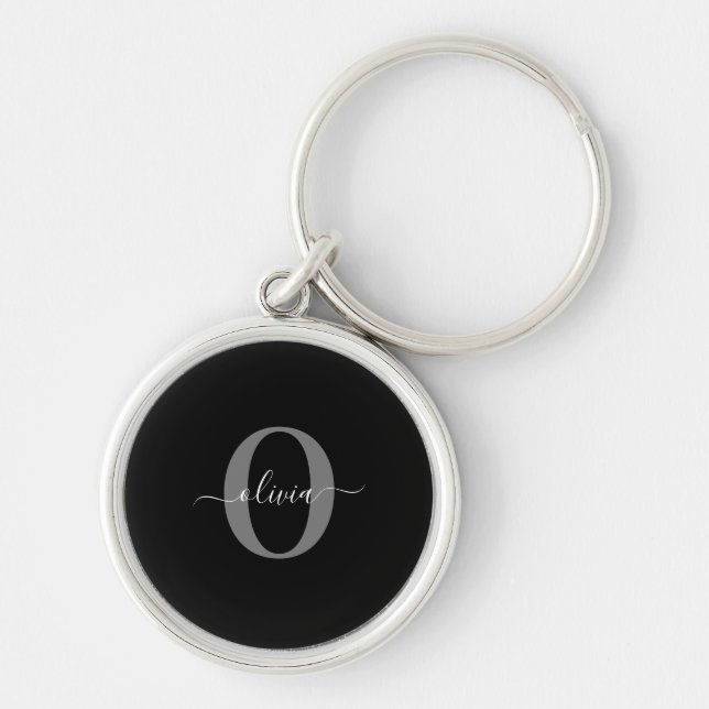 Personligt monogram skriptnamn svart vitt grått rund silverfärgad nyckelring (Framsidan)
