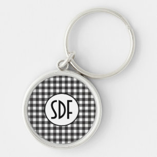 Personligt monogram svart och vitt rutigt rund silverfärgad nyckelring