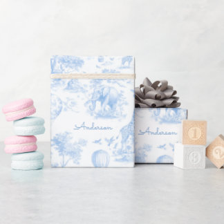 Personligt presentpapper för baby shower med blå T