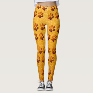 Pet tass guld glitter skriver ut på guld-bakgrunde leggings