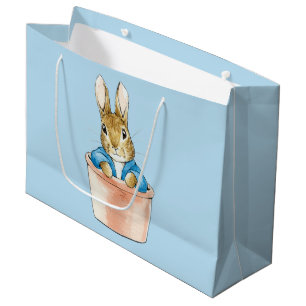Peter Rabbit Sitta i en pot