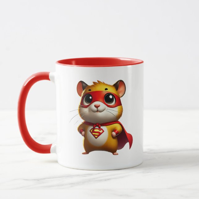 Petit hamster super-héros avec sa cape. mugg (Vänster)
