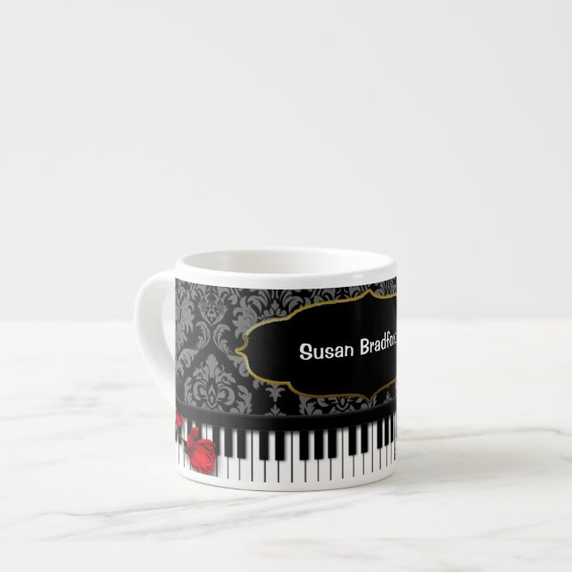 PIANO-/MUSICespressomuggen med pianot stämm/damast Espressomugg (Framsida vänster)