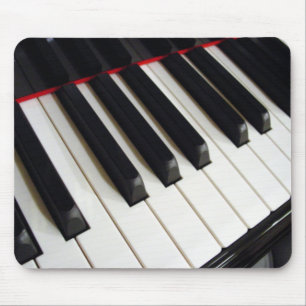 Pianonycklar fotograferar musmatta