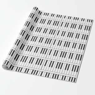 Pianonycklar som slår in papper presentpapper