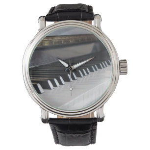 Pianot stämm klockan med svart fäster armbandsur