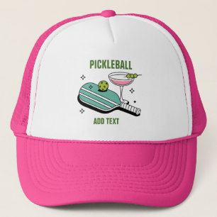 Pickleball-paddle och cocktail keps