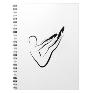 Pilates poserar anteckningsbok