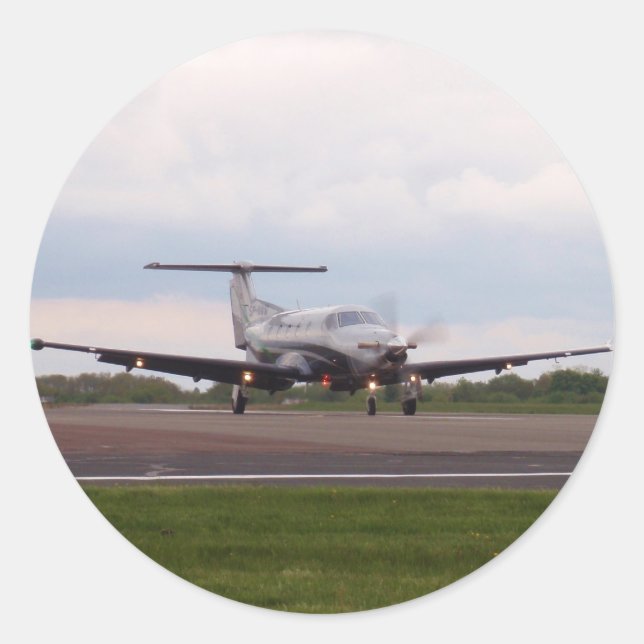 Pilatus PC 12 Runt Klistermärke (Framsida)