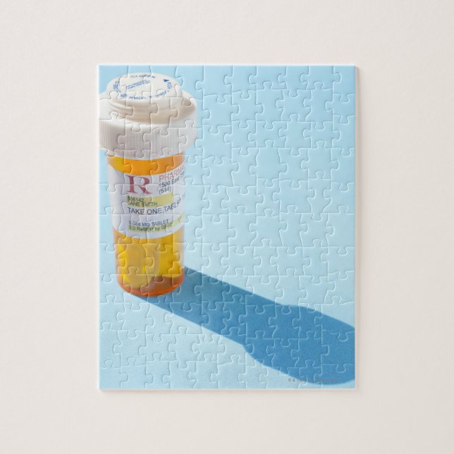 Pill flaska fullt of medicin pussel (Vertikal)