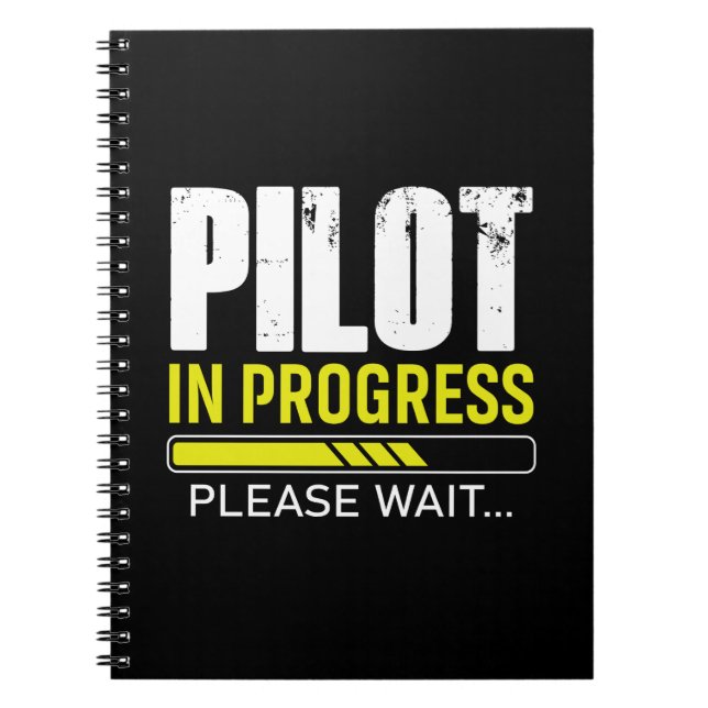 Pilot under utbildning… Vänligen vänta | Pilotpres Anteckningsbok (Framsidan)