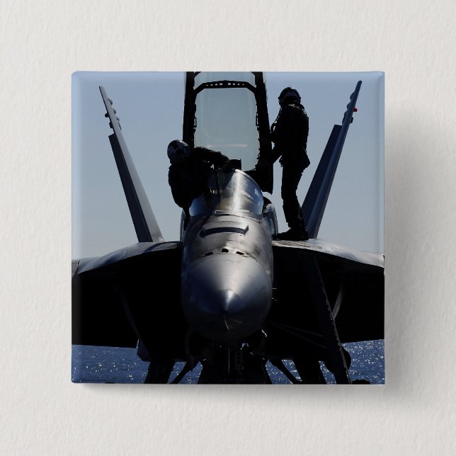 Piloter genomför en inspektion före flygning knapp (Framsida)