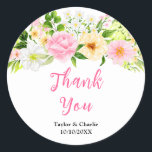Pink and Yellow Floral Wedding Thank You Runt Klistermärke<br><div class="desc">This beautiful and elegant wedding thank you sticker features watercolor pink,  yellow and white flowers with foliage. The text combines handwritten script and serif fonts for a stylish and modern look. This is perfect for a spring or summer rustic wedding.</div>