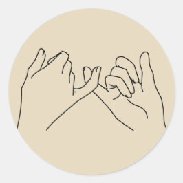 pinky-löfte runt klistermärke