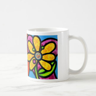 Pinwheeldaisy i gult kaffemugg