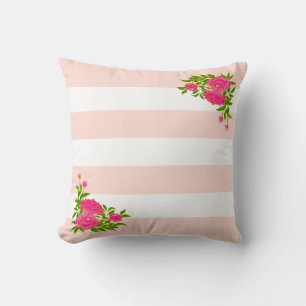 Pionblommor på ljus rosa och vitrandig kudde