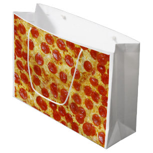 Pizzatrycket på gåvan hänger lös