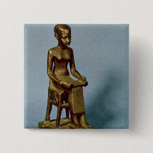 Placerad staty av det Imhotep innehav ett öppet Knapp